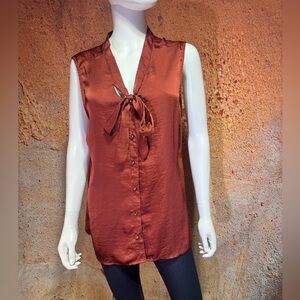 NWOT Rust colored XL sleeveless blouse with tie at neck.